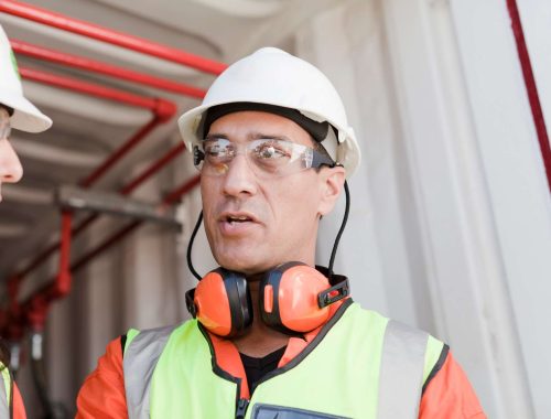 leadership engaging in a discussion with an employee